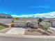Charming home with a three-car garage, inviting entryway, and manicured landscaping at 1034 Halfmoon Dr, Castle Rock, CO 80104