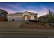 Attractive single-Gathering home with well-maintained landscaping, a three-car garage and a welcoming entrance at 1034 Halfmoon Dr, Castle Rock, CO 80104