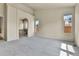 Light filled main bedroom featuring neutral walls, carpet floors and ensuite bath access at 1034 Halfmoon Dr, Castle Rock, CO 80104
