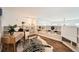 Stylized secondary bedroom space with wood floors, zebra rug, and built-in shelving at 108 W Byers Pl # 106, Denver, CO 80223