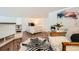 Bedroom with wood floors, a zebra rug, and modern decor at 108 W Byers Pl # 106, Denver, CO 80223
