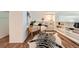 Stylish bedroom featuring wood floors, a zebra rug, and a comfortable seating area at 108 W Byers Pl # 106, Denver, CO 80223