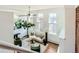 Spacious living room with lots of light, a ceiling fan, and contemporary decor at 108 W Byers Pl # 106, Denver, CO 80223