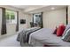 Bedroom with large windows and view to office and desk area at 14682 W Amherst Pl, Lakewood, CO 80228