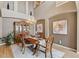 Elegant dining room with high ceilings, chandelier, and natural light at 14682 W Amherst Pl, Lakewood, CO 80228