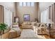 Inviting living room with soaring ceilings and comfortable seating at 14682 W Amherst Pl, Lakewood, CO 80228