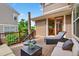 Outdoor patio and lounge area with sliding door access to interior dining room at 14682 W Amherst Pl, Lakewood, CO 80228