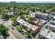 Aerial view of the neighborhood showcasing residential buildings and tree-lined streets at 22 E Bayaud Ave, Denver, CO 80209