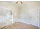 This bedroom features hardwood floors, an open doorway, a closet and a ceiling fan at 22 E Bayaud Ave, Denver, CO 80209