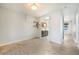Open living room featuring hardwood floors and a pass-through view to the kitchen at 22 E Bayaud Ave, Denver, CO 80209