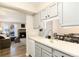 Kitchen and living room combination area at 7665 E Eastman Ave # 107B, Denver, CO 80231