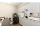 Charming kitchen features modern fixtures, stainless steel appliances, and wood-look floors at 7665 E Eastman Ave # 107B, Denver, CO 80231