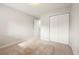 Carpeted bedroom showcasing a double door closet, offering ample storage space at 695 Manhattan Dr # 5, Boulder, CO 80303