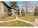 View of building exterior with well-maintained lawns and inviting walkways enhancing the outdoor appeal at 695 Manhattan Dr # 5, Boulder, CO 80303
