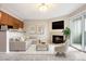 Bright living room featuring a fireplace, sliding glass doors, and neutral decor at 695 Manhattan Dr # 5, Boulder, CO 80303