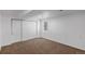 Basement area with carpeting and built in closet providing storage options at 867 S Grape St, Denver, CO 80246