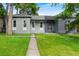 Charming gray home with well-maintained lawn and inviting walkway at 2737 N Marion St, Denver, CO 80205