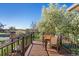 Exterior view of the deck with outdoor furniture and railing at 9998 W 70Th Pl, Arvada, CO 80004