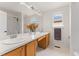Bright bathroom offers double sinks with lots of counter space and large mirror at 1842 Reliance Cir, Superior, CO 80027
