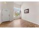 Inviting entryway with high ceilings and a large window, creating a bright and welcoming atmosphere at 1842 Reliance Cir, Superior, CO 80027