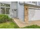 The front of this house features light blue siding, brick accents, and a well-manicured lawn at 1842 Reliance Cir, Superior, CO 80027