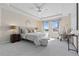 Spacious main bedroom with tray ceilings, neutral tones, and ample natural light, creating a serene and relaxing retreat at 381 Rainbow Ln, Lafayette, CO 80026
