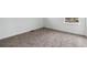 A bedroom featuring neutral carpeting and bright, natural light at 9237 Truckee Ct, Commerce City, CO 80022
