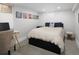 Bedroom with modern decor, neutral carpet and a stylish desk area at 3039 W Denver Pl, Denver, CO 80211