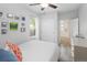 Cozy bedroom with a ceiling fan, closet, and natural light at 3039 W Denver Pl, Denver, CO 80211