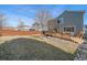 Green backyard and patio offer plenty of space to enjoy the outdoors at 5253 S Jericho St, Centennial, CO 80015