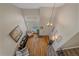 Bright, open living room with hardwood floors, high ceilings, and large windows at 5253 S Jericho St, Centennial, CO 80015