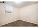 Bedroom with beige walls, carpet flooring, and natural light from a window at 547 S 3Rd Avenue, Brighton, CO 80601