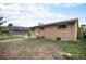 Charming brick ranch-style home with a well-maintained front yard at 547 S 3Rd Avenue, Brighton, CO 80601