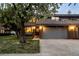 Charming front exterior of a home with attached two car garage at 15220 E Caley Ave, Centennial, CO 80016