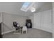 Loft featuring skylight, TV and gaming area, and nearby closet at 15220 E Caley Ave, Centennial, CO 80016