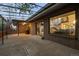 Covered patio with an American flag and staircase visible inside at 15220 E Caley Ave, Centennial, CO 80016