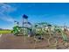 Community playground with climbing dome and slides for fun and recreation at 709 Twining Ave, Brighton, CO 80601
