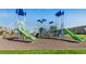 Neighborhood playground with slides and climbing structures provides recreational opportunities at 709 Twining Ave, Brighton, CO 80601