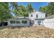 Backyard patio area with seating, perfect for entertaining outdoors at 8710 Alta Vista Dr, Arvada, CO 80004