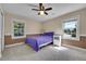 Comfortable bedroom with carpet, natural light, and neutral color scheme at 8710 Alta Vista Dr, Arvada, CO 80004