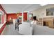 Bright living room with hardwood floors, natural light, and stylish decor at 8710 Alta Vista Dr, Arvada, CO 80004