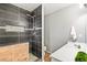 Modern bathroom featuring a sleek walk-in shower with beautiful tile work at 5264 E 129Th Pl, Thornton, CO 80241