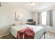 Comfortable bedroom featuring a desk, neutral tones, and great natural light at 5264 E 129Th Pl, Thornton, CO 80241