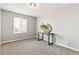 Simple bedroom with ample natural light, neutral colors, and a modern desk at 5264 E 129Th Pl, Thornton, CO 80241