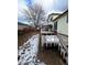 Spacious backyard showcasing a wooden deck and fenced yard, perfect for outdoor entertaining at 14989 E Pacific Pl, Aurora, CO 80014