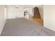 Open living space with a view of the staircase and fireplace at 18951 E 43Rd Ave, Denver, CO 80249