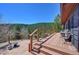 Spacious deck with seating and mountain views at 617 Hummingbird Trl, Idaho Springs, CO 80452