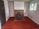 Inviting sitting room with a decorative brick fireplace at 6961 E Arkansas Ave, Denver, CO 80224