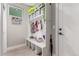Organized mudroom with built-in storage, a bench, and convenient access to the entry at 21451 E 60Th Ave, Aurora, CO 80019
