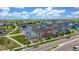 Beautiful new neighborhood with sidewalks, landscaping, and solar panels on the roofs of the homes at 21451 E 60Th Ave, Aurora, CO 80019